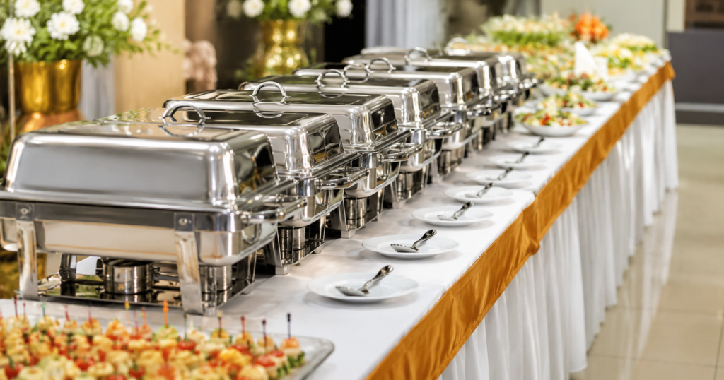 Corporate catering buffet setup with chafing dishes for a Johannesburg business event