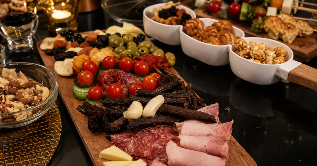 Modern African grazing table with biltong, cured meats, nuts and appetisers by BontleFela